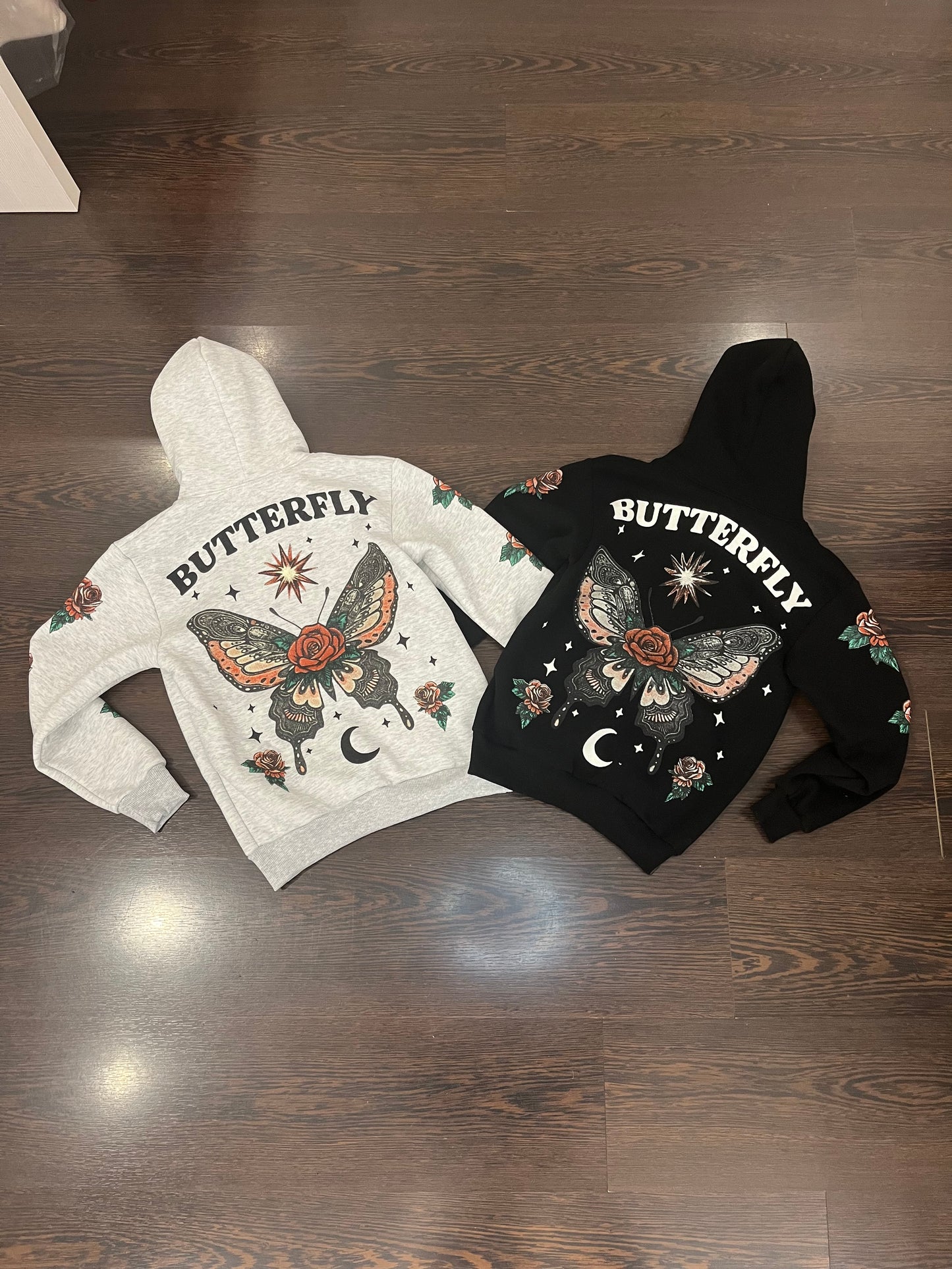 felpa nera farfalla